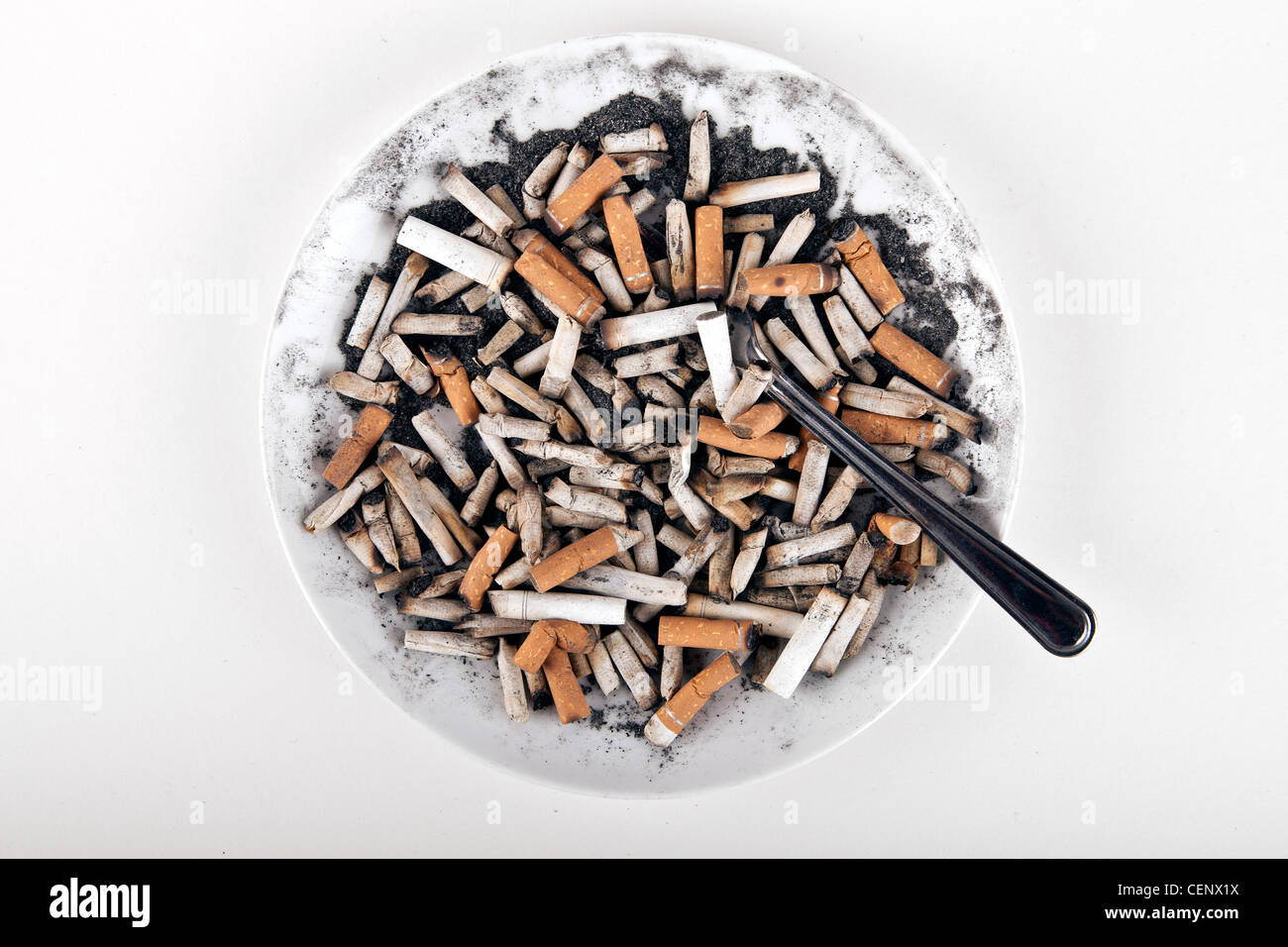 cigarette plate Cigarettes on a plate Stock Photo