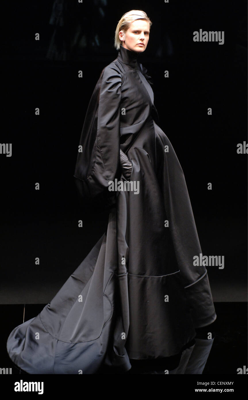 Givenchy Paris Haute Couture Autumn Winter Female model Stella Tennant  wearing a black matte silk maxi length ball gown train Stock Photo - Alamy