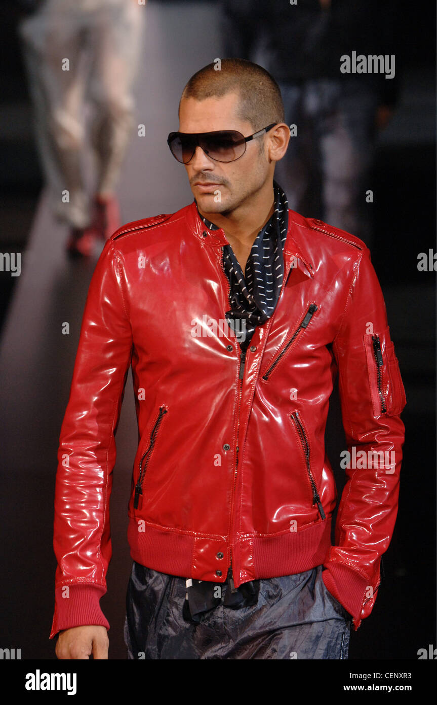 Emporio Armani Milan Ready to Wear Menswear Spring Summer Brunette male  model wearing a red pattened leather motorcycle jacket Stock Photo - Alamy