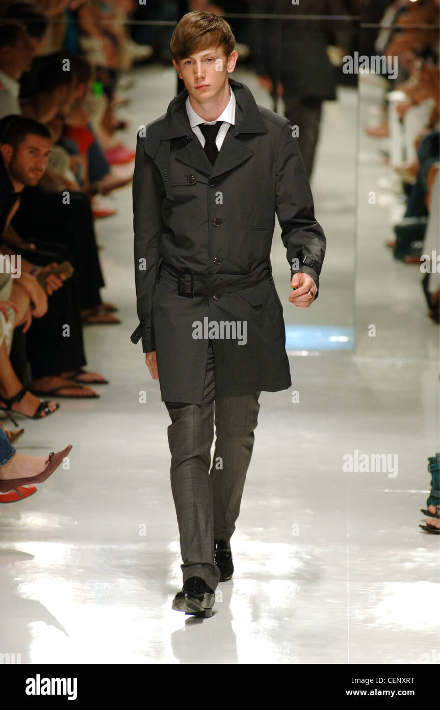 J Lindeberg Milan Ready to Wear Menswear Spring Summer Blonde male model  walking down the runway wearing a black single Stock Photo - Alamy