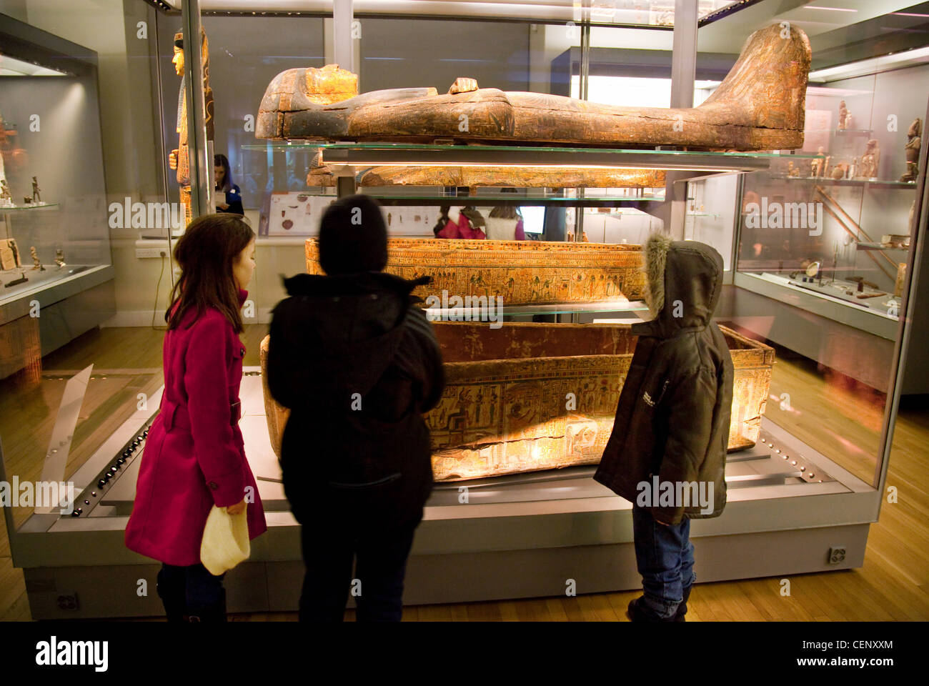 Children looking at an egyptian sarcophagus, The Fitzwilliam museum, Cambridge UK Stock Photo