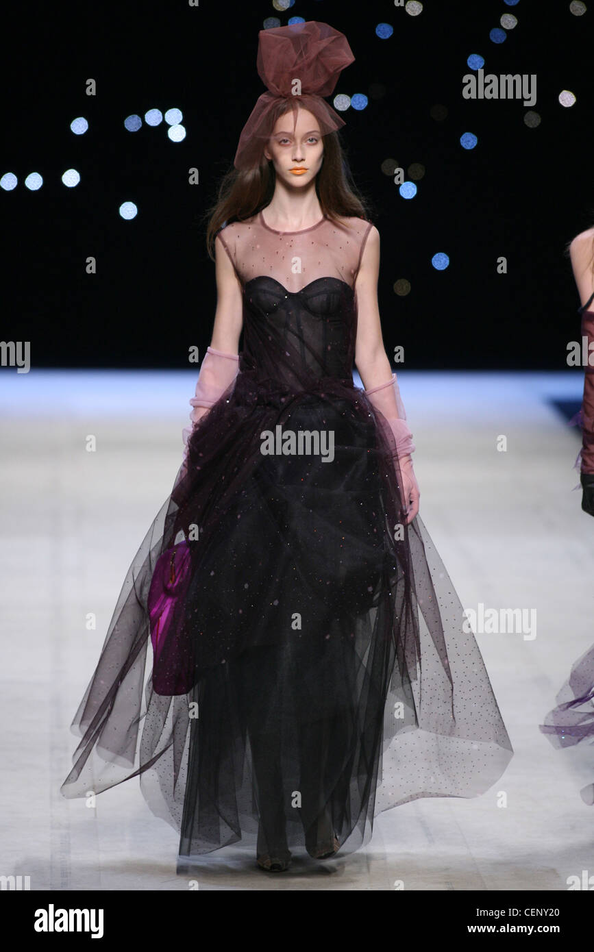 Louis Vuitton Ready to Wear Spring Summer Sleeveless embellished tulle  gathered overlay ballgown, accessorized brown tulle Stock Photo - Alamy