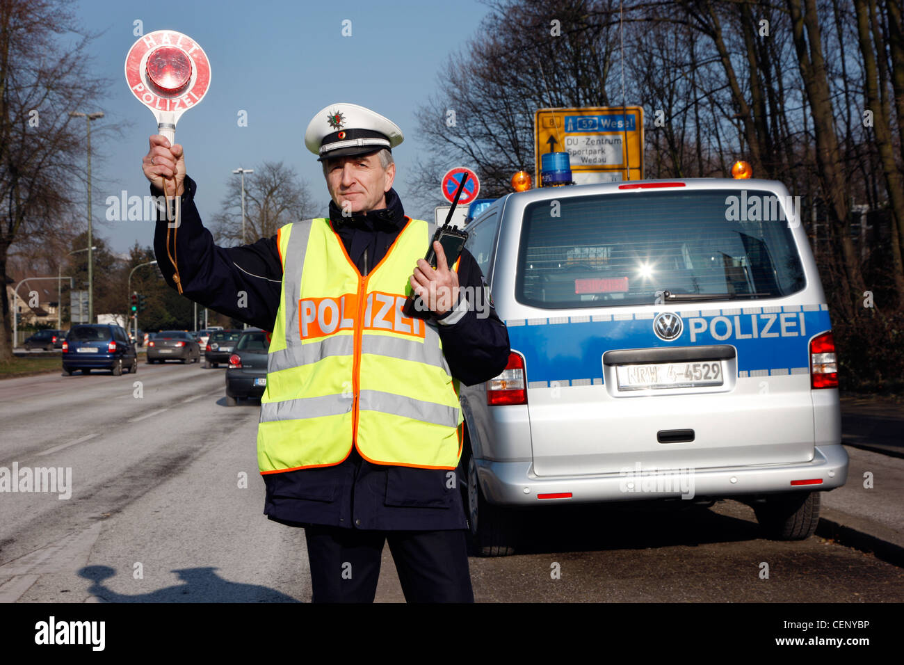 Police control, traffic speed control, police officer stops cars on a street. Stock Photo