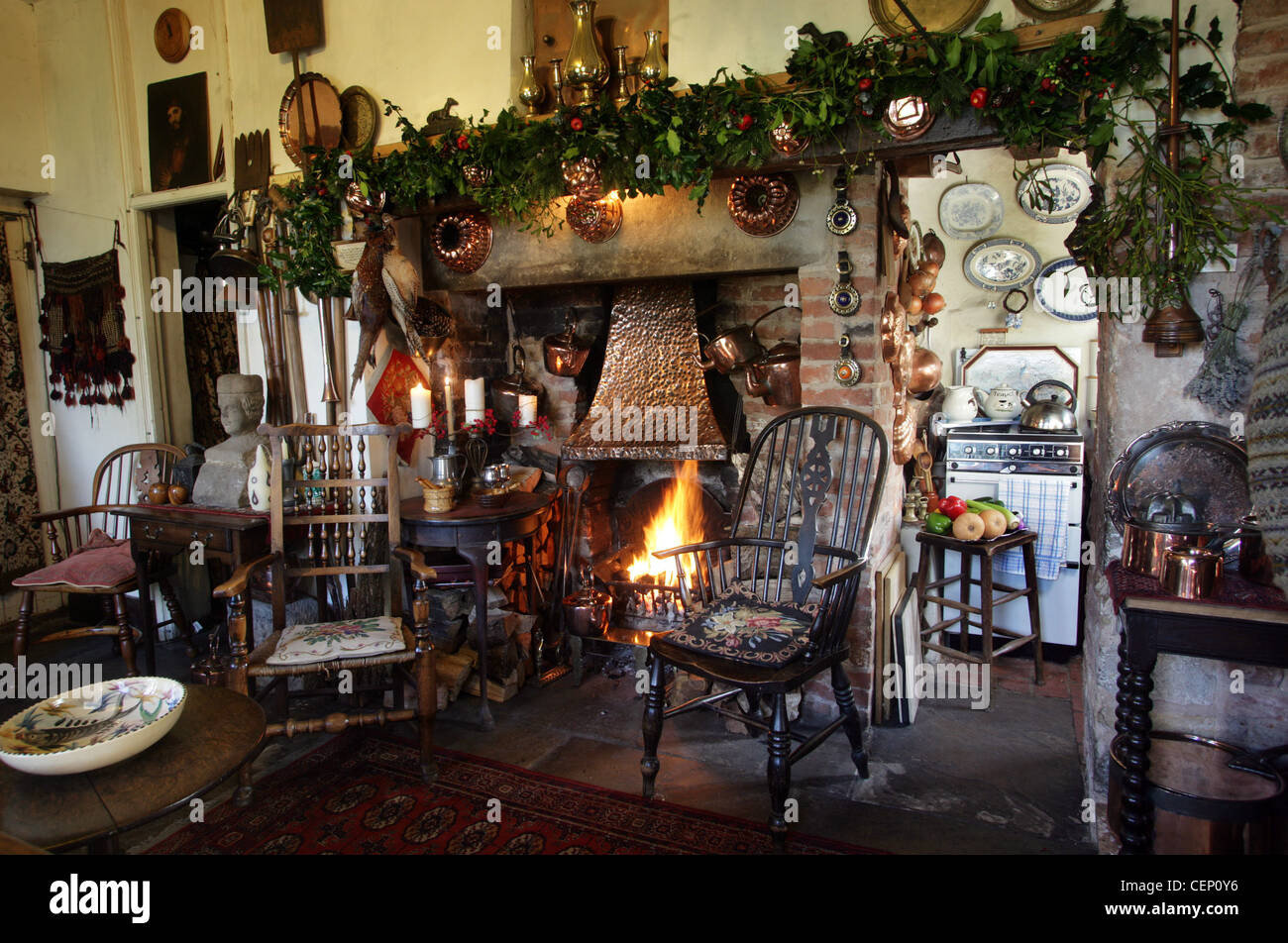Kitchen With Stone Floor Chairs Around Fireplace Stock Photo