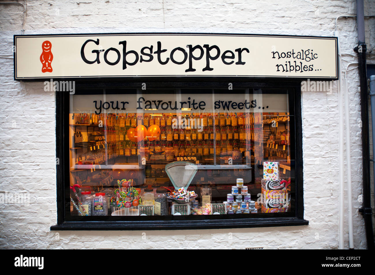 Old fashioned sweet shop in Louth, Lincolnshire called gobstoppers, candy cane scales, Stock Photo