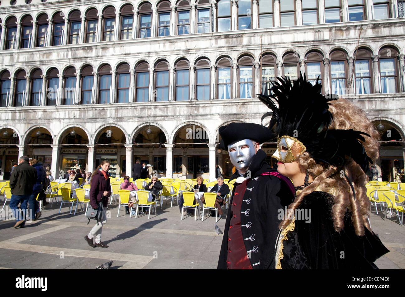 Masked revellers in St Mark's Square at the Venice Carnival in Italy ...