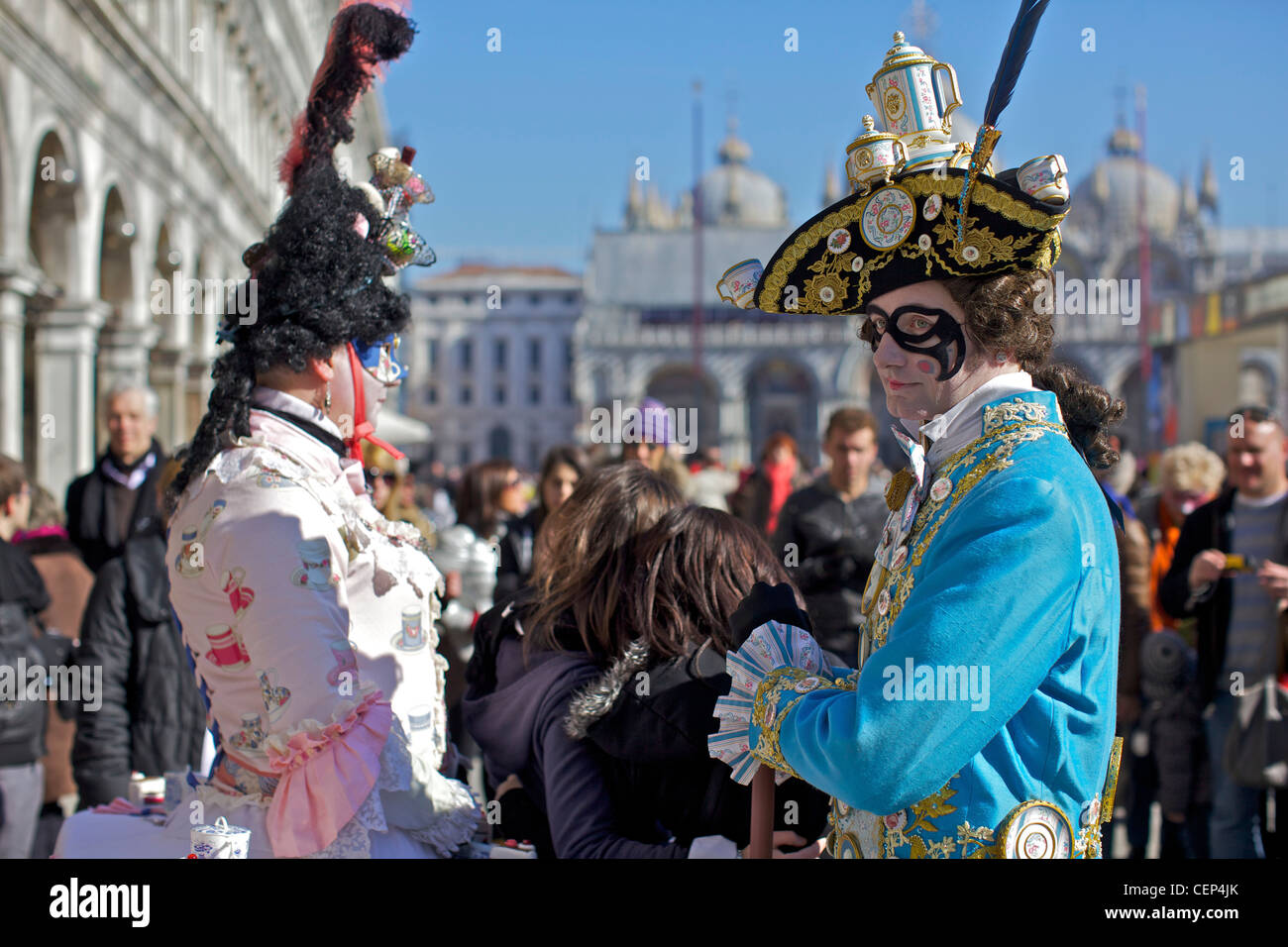 Masked revellers in St Mark's Square at the Venice Carnival in Italy ...