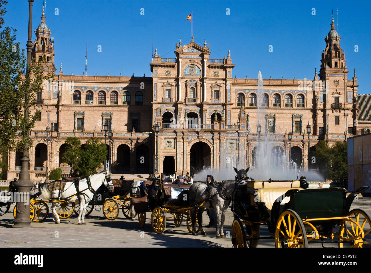 Spain, Seville, Plaza de Espana with horse drawn buggy rides, carriages Stock Photo