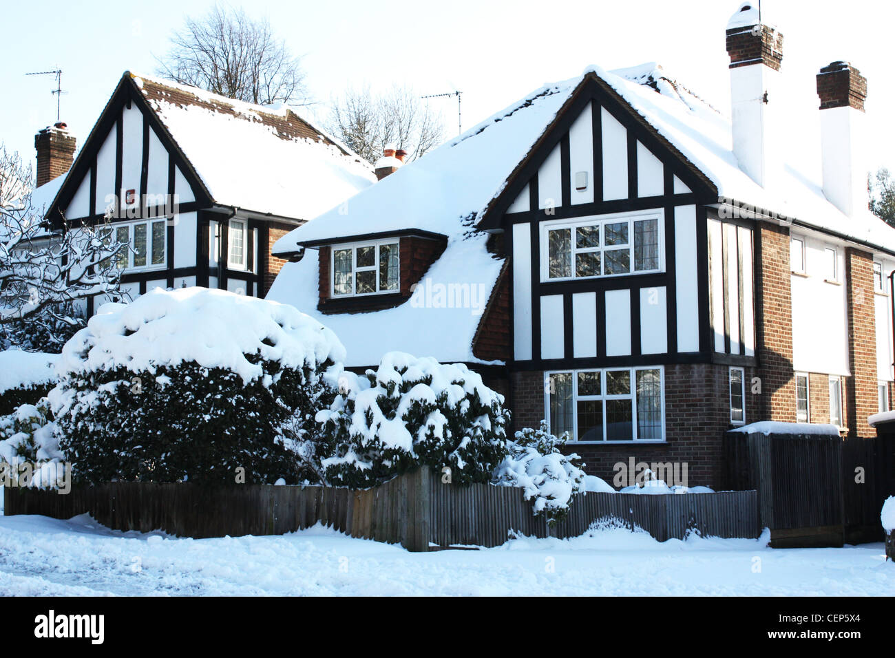 British houses covered in snow during winter season Stock Photo