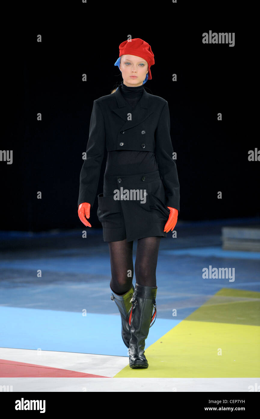 adidas Yohji Yamamoto New York Ready to Wear Autumn Winter Two piece black  cropped jacket, red hat, short skirt, polo neck Stock Photo - Alamy