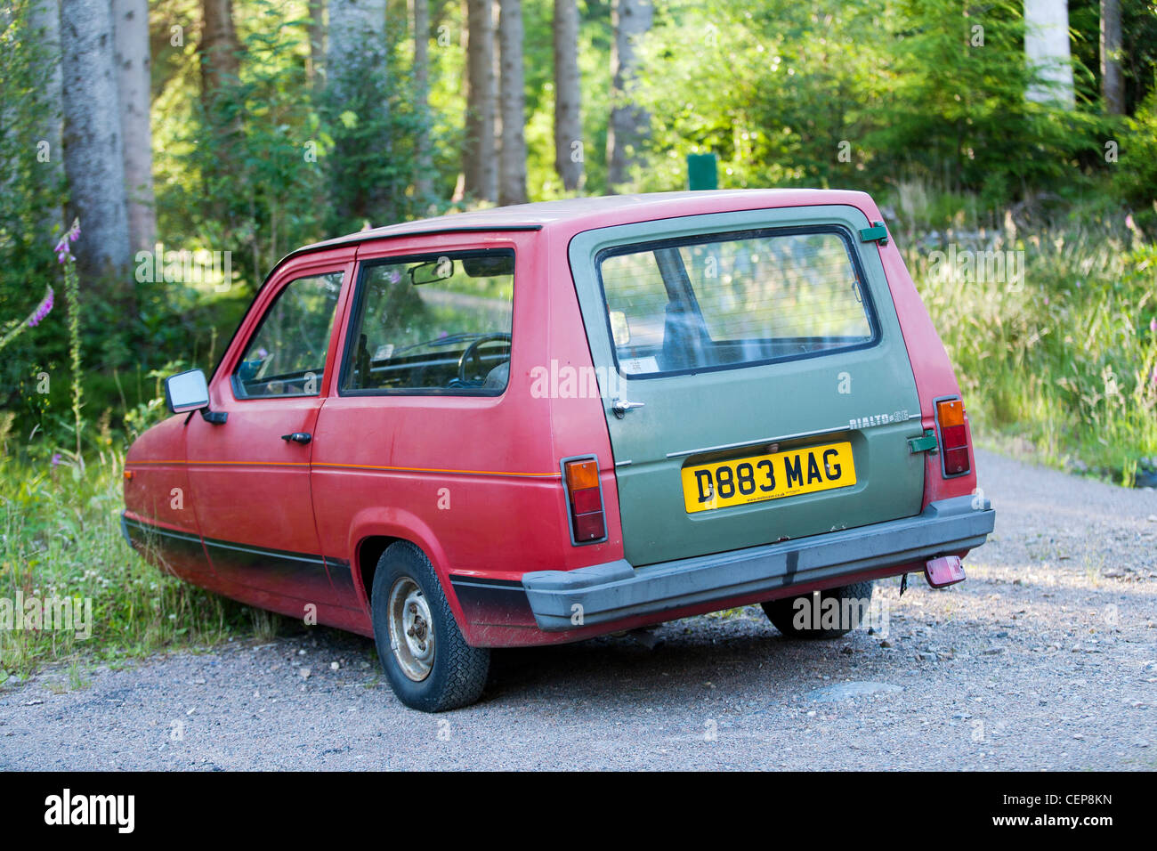 A reliant Rialto SE three wheeled car parked parked at a trailhead in  Glencoe in Western Scotland Stock Photo - Alamy