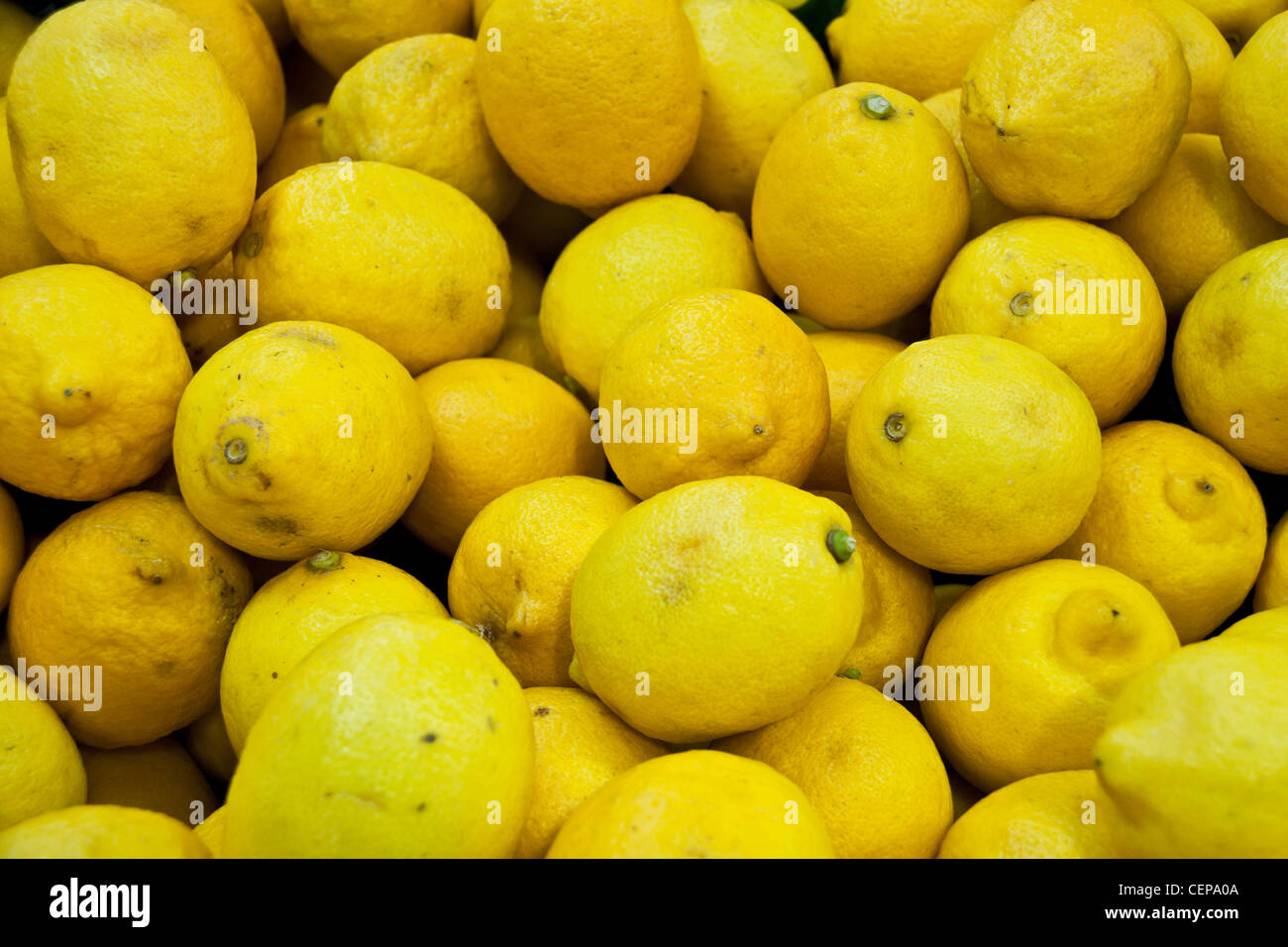 Lemons raw background Stock Photo