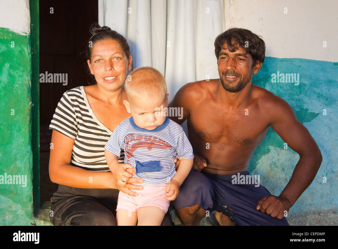 Roma gypsy parents in Bulgaria Stock Photo