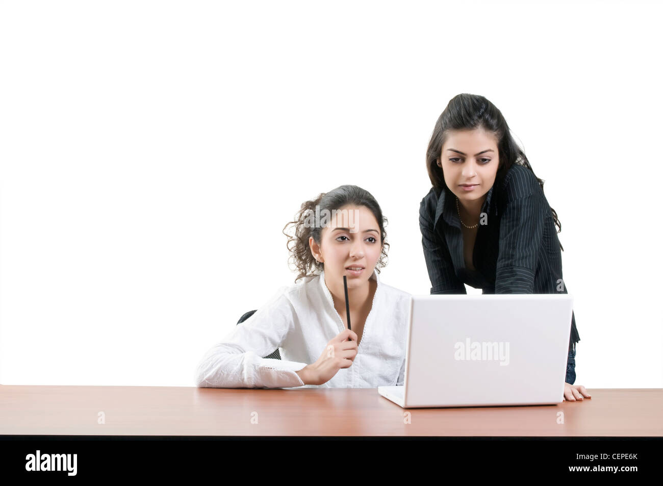 two girls working Stock Photo -Alamy