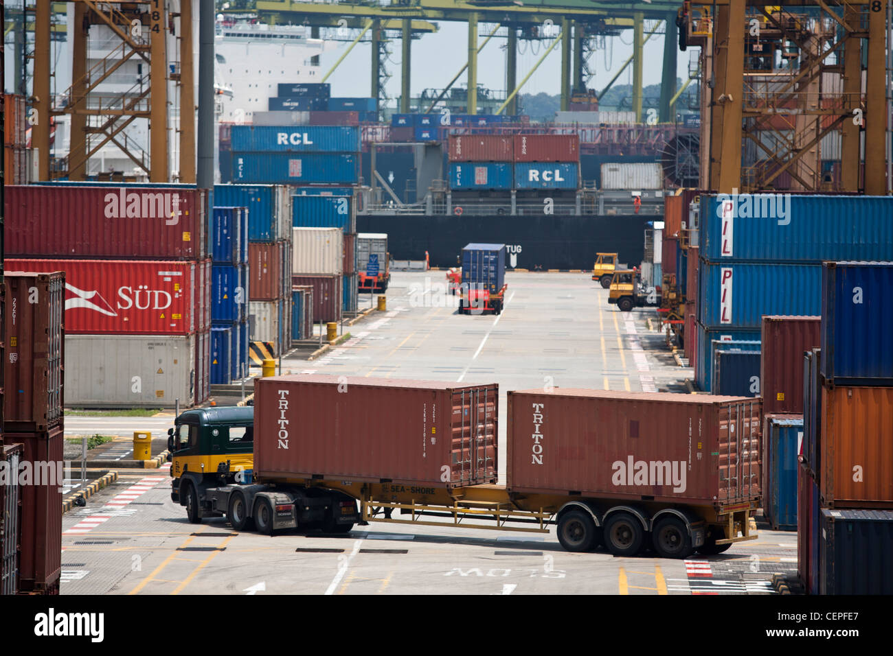 Trucks Transport Shipping Containers At The Port Of Singapore Stock 