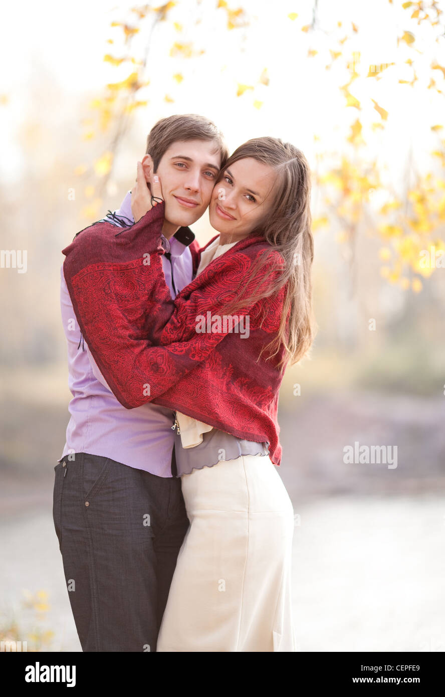 happy young couple in the park Stock Photo - Alamy