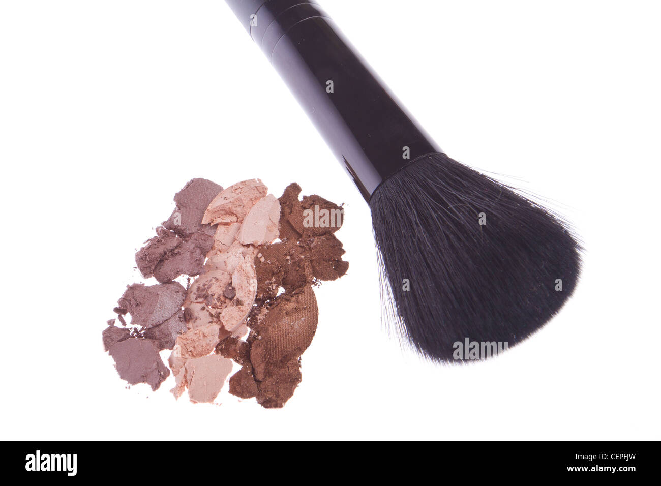 cream eyeshadows with brush isolated on white background Stock Photo