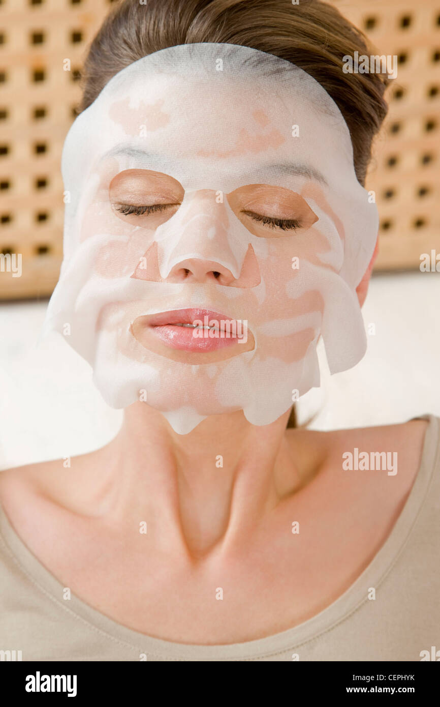 Woman with beauty mask Stock Photo