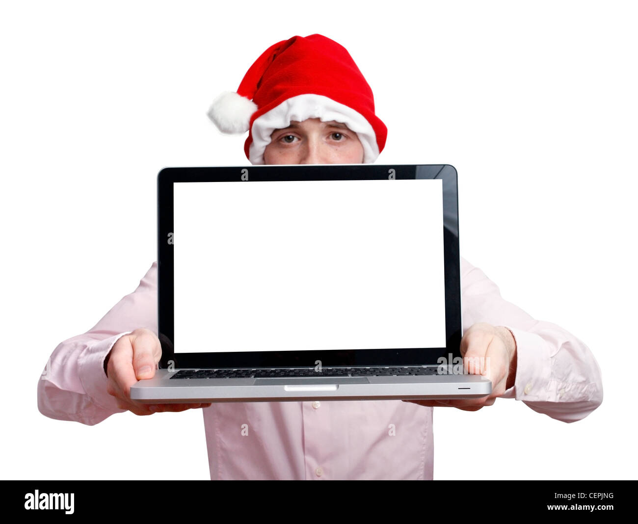 Businessman with santa hat and computer Stock Photo