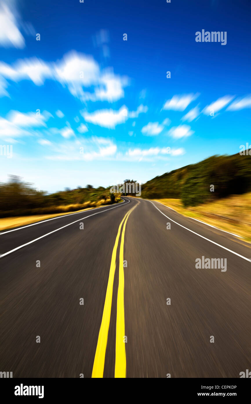 High speed road pass through the jugle with cloud background Stock Photo