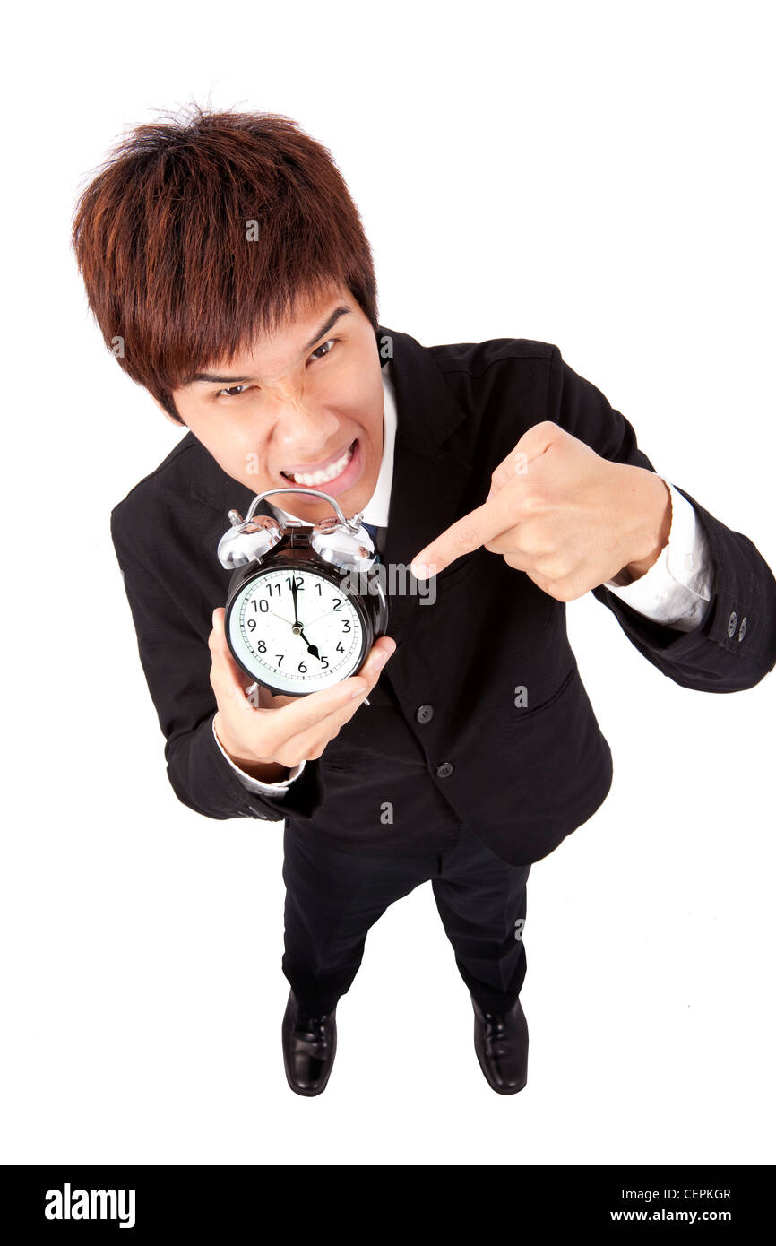 Time to go home.businessman holding a clock Stock Photo
