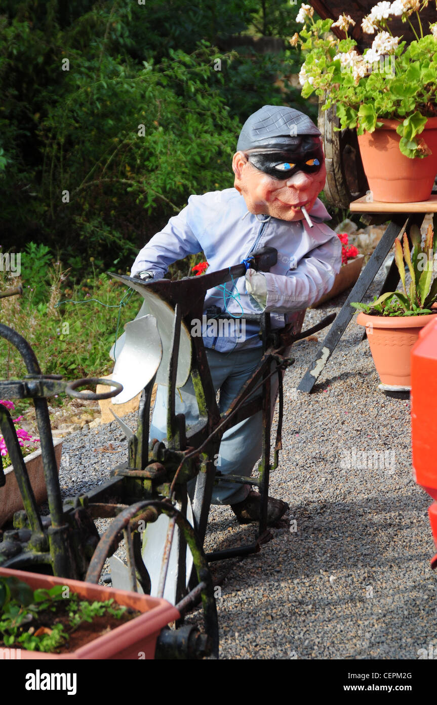Garden figures, tools, Les Ardennnes, France Stock Photo
