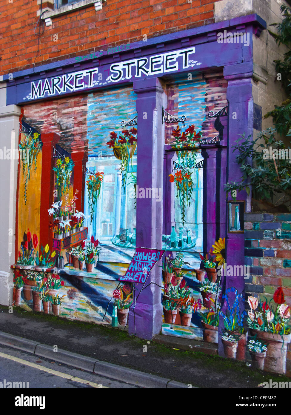 Colourful wall painting in Market Street in Nailsworth, Gloucestershire, UK Stock Photo