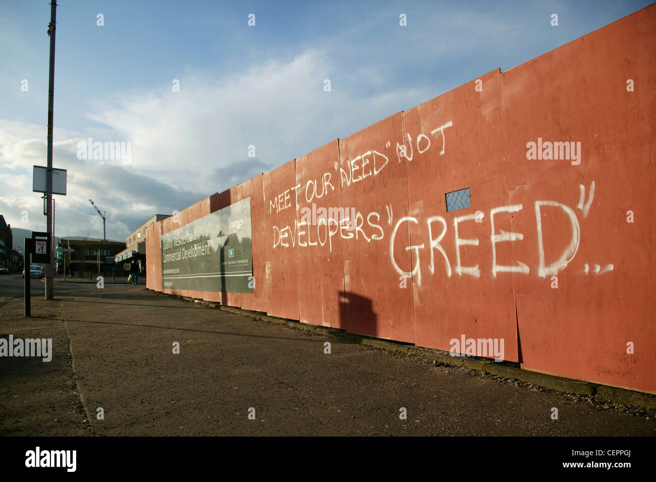 Graffiti on the wall of a development area in Shankill Parade. Stock Photo