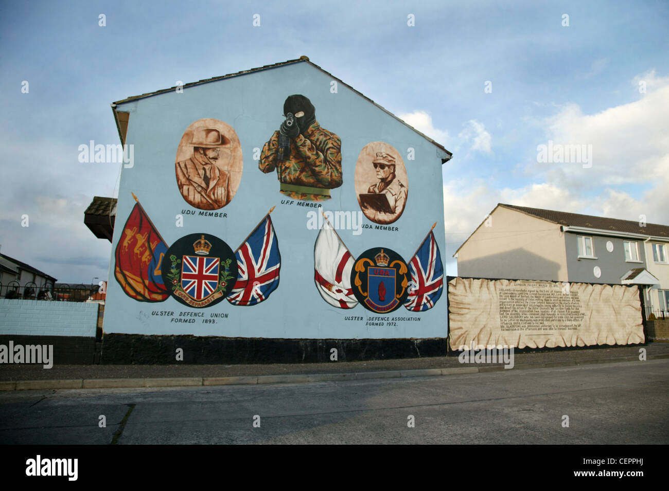 Political murals from the Ulster defence union in Boundary street. Stock Photo