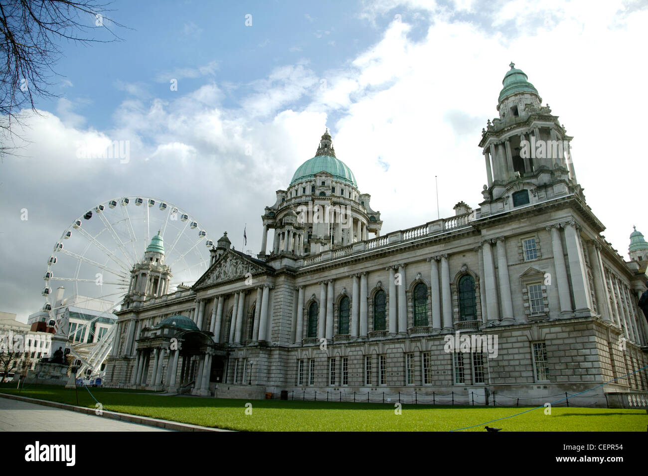 Exterior view of Belfast City Hall and the Belfast Wheel. Stock Photo