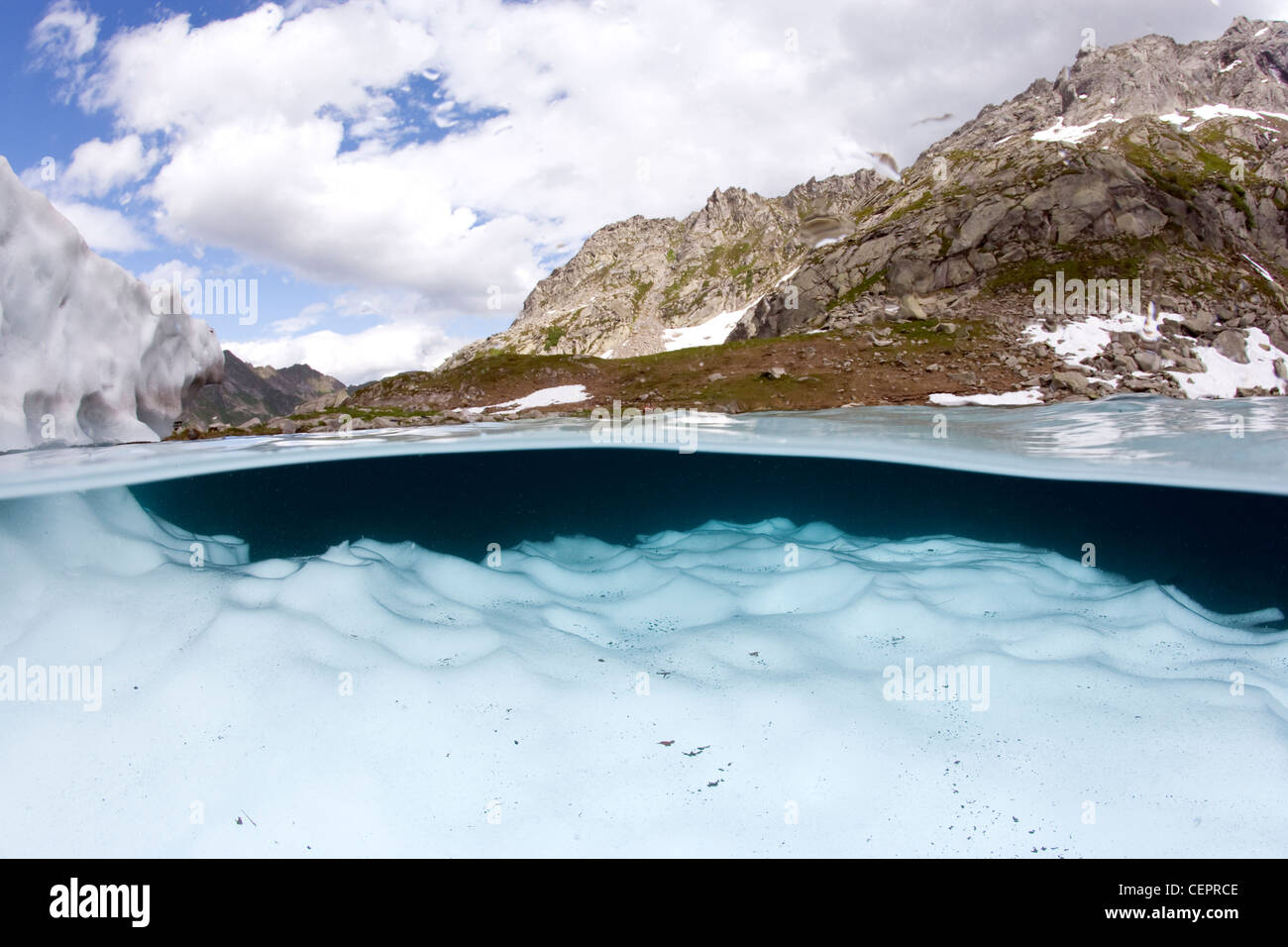 Floating Ice in Mountain Lake Sassolo, Sambuco Valley, Ticino, Switzerland Stock Photo