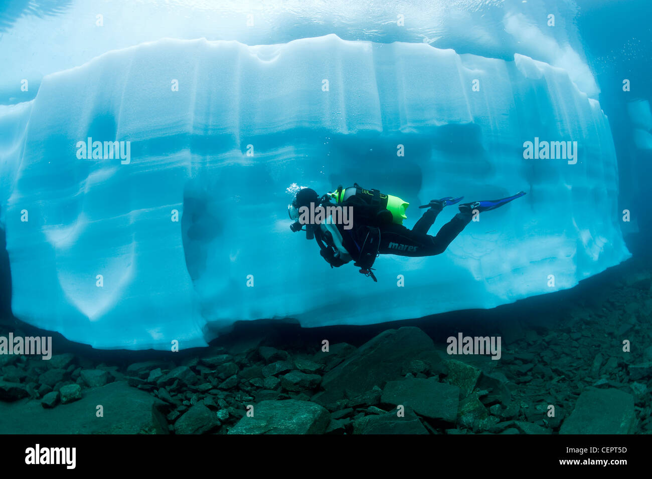 Ice Diving in Mountain Lake Sassolo, Sambuco Valley, Ticino, Switzerland Stock Photo