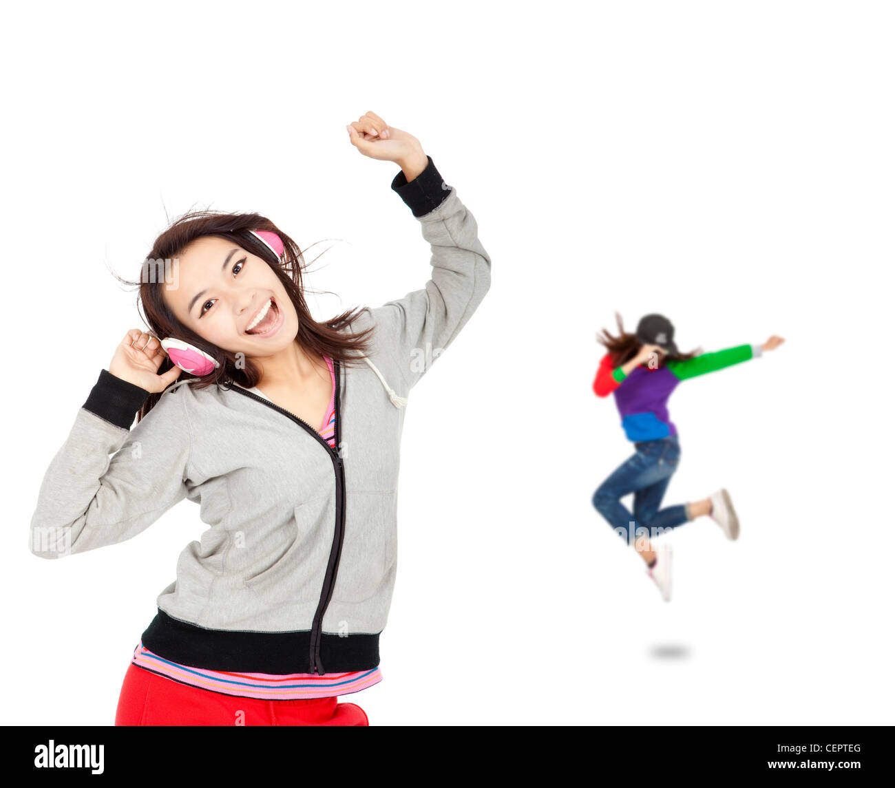 happy asian young woman listen music and dancing Stock Photo