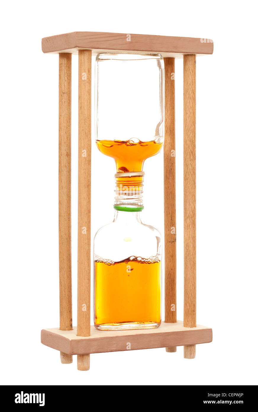 hourglass made from bottles with alcohol on white Stock Photo