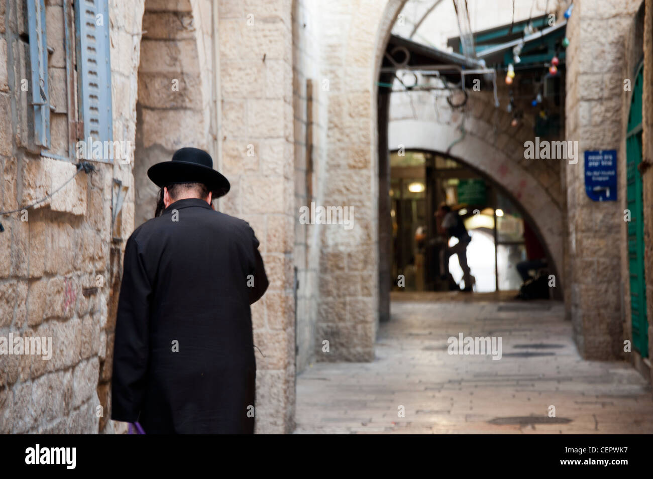 Shabbat day, a haredim is going to the wailing wall. Stock Photo