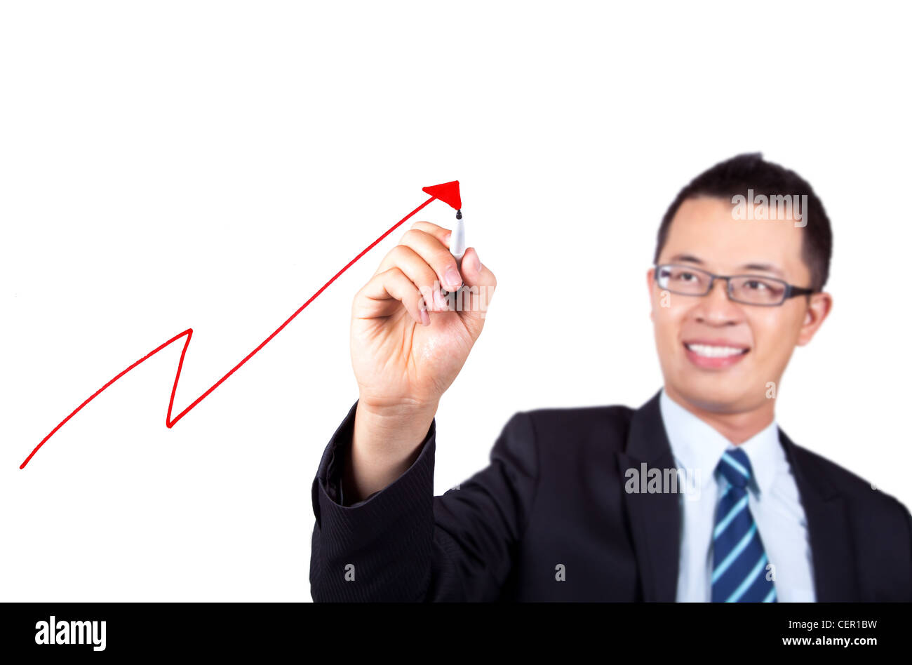 business woman drawing a profit graph Stock Photo