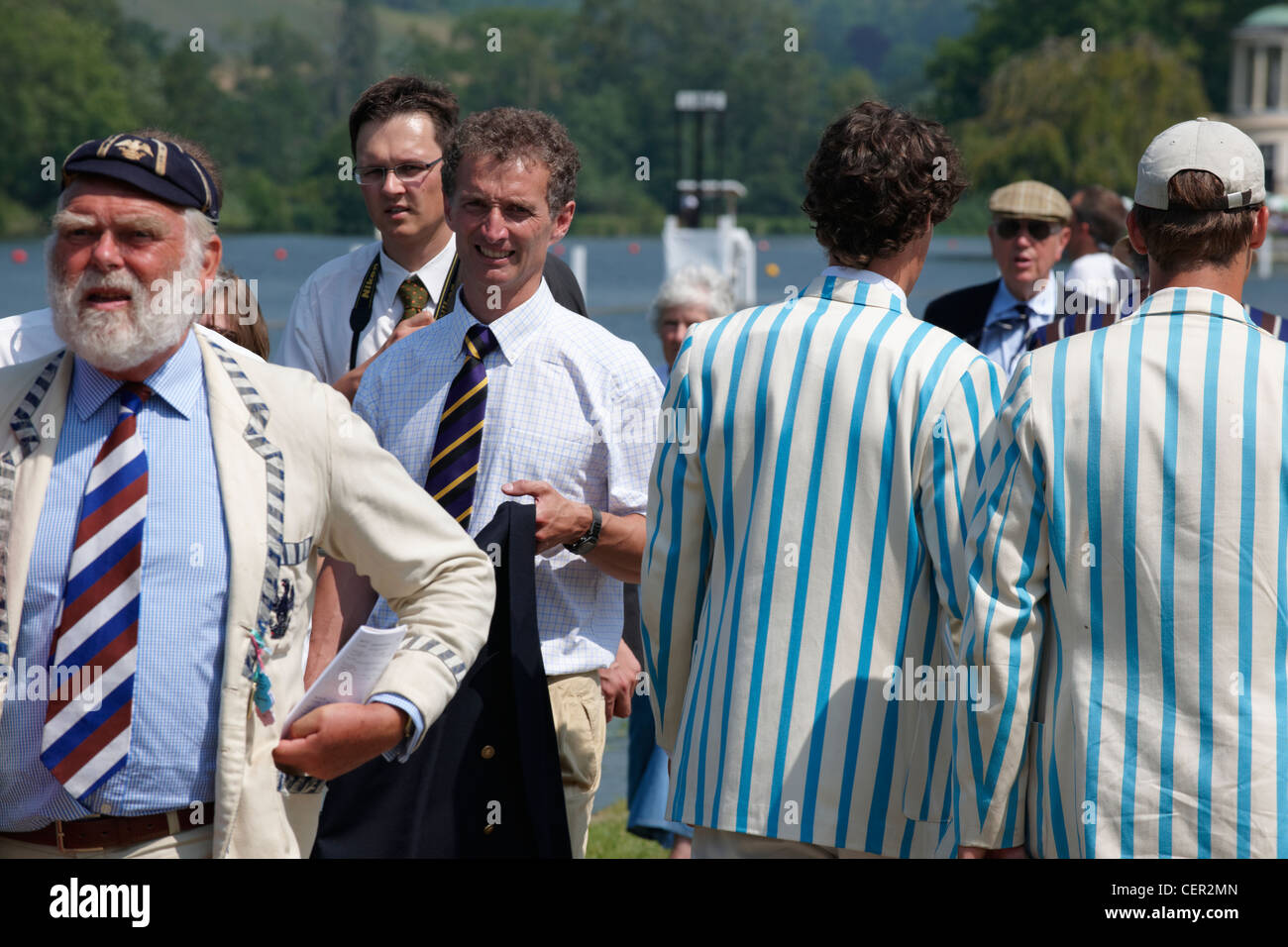 Rowing club members making their way along the riverside path at the annual Henley Royal Regatta. Stock Photo