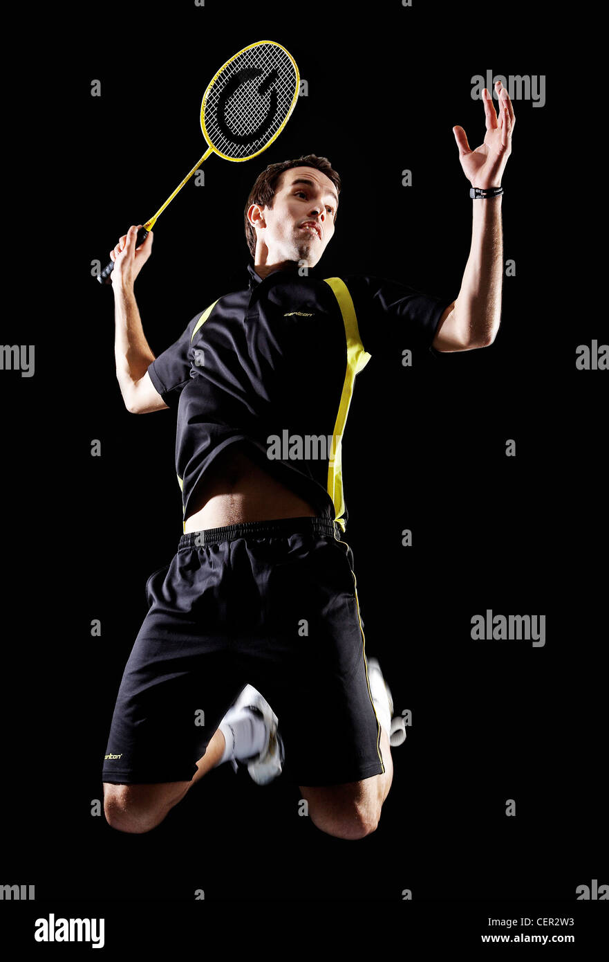 World champion badminton player, Nathan Robertson jumps for a smash. Stock Photo