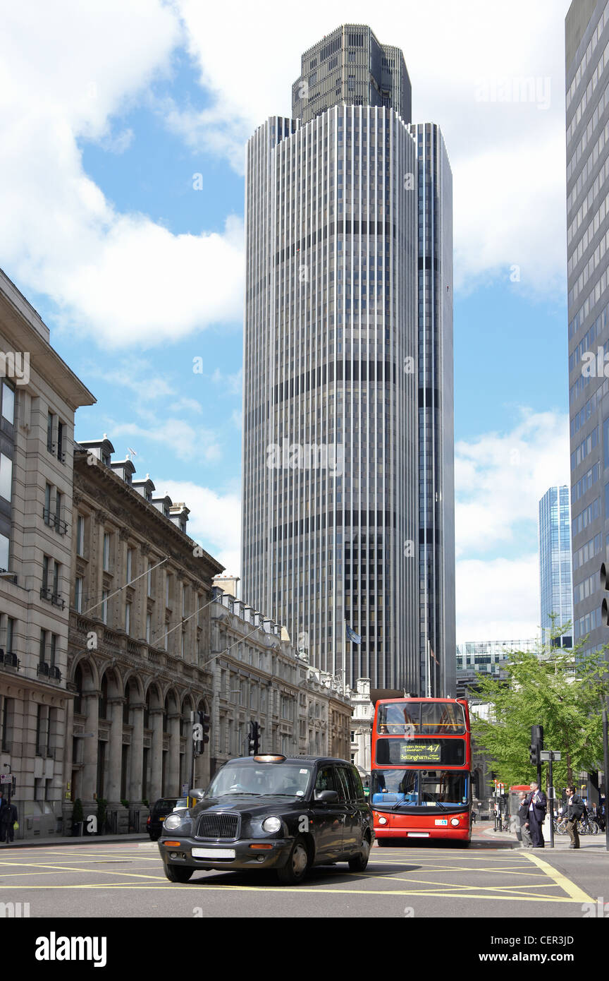 Nat West Tower with a black cab and red bus in London. Stock Photo