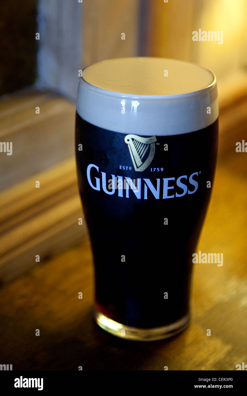 A pint of Guinness in the South Pole Inn County Kerry Ireland Stock Photo