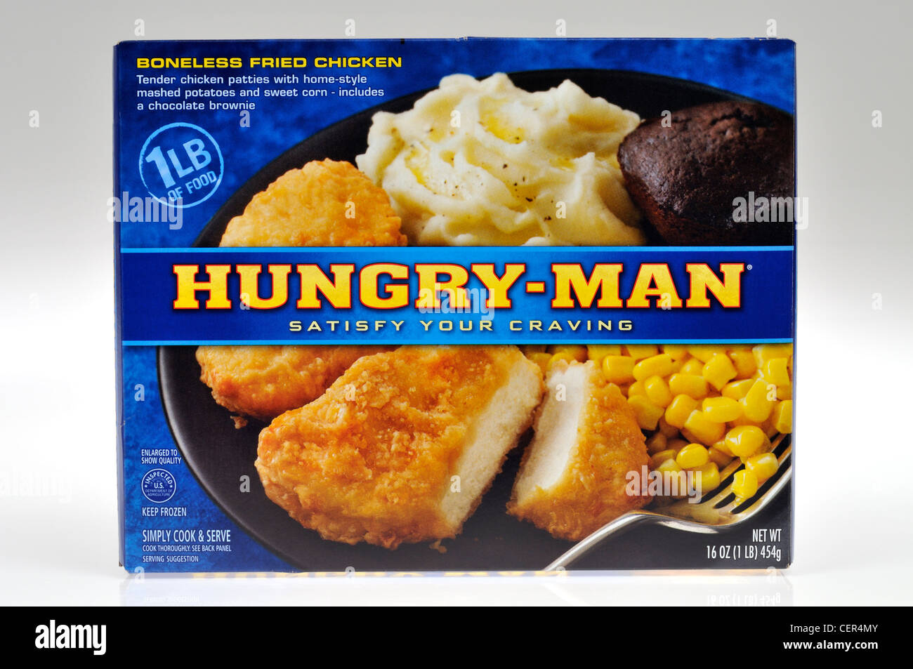 Box of  Swanson Hungry Man Fried Chicken frozen TV dinner ready meal closeup. Stock Photo