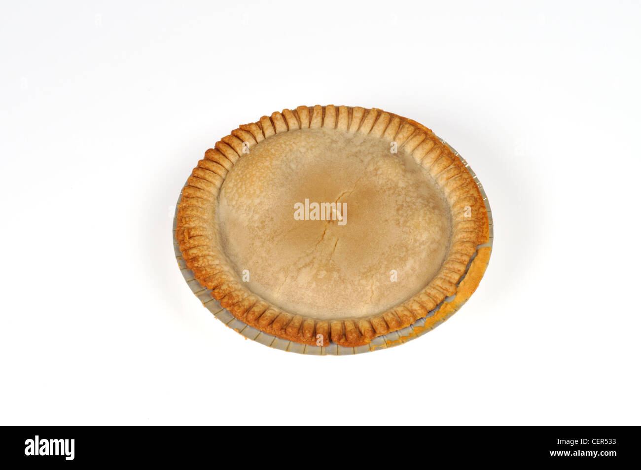 Uncooked Chicken pot pie in aluminum tin on white background cut out. Stock Photo