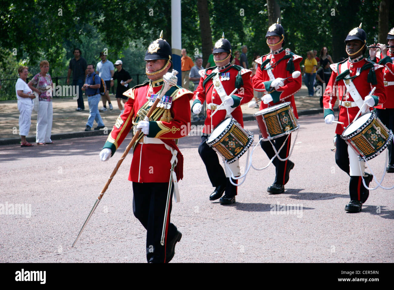 A military band parades down the Mall near to Buckingham Palace. Stock Photo