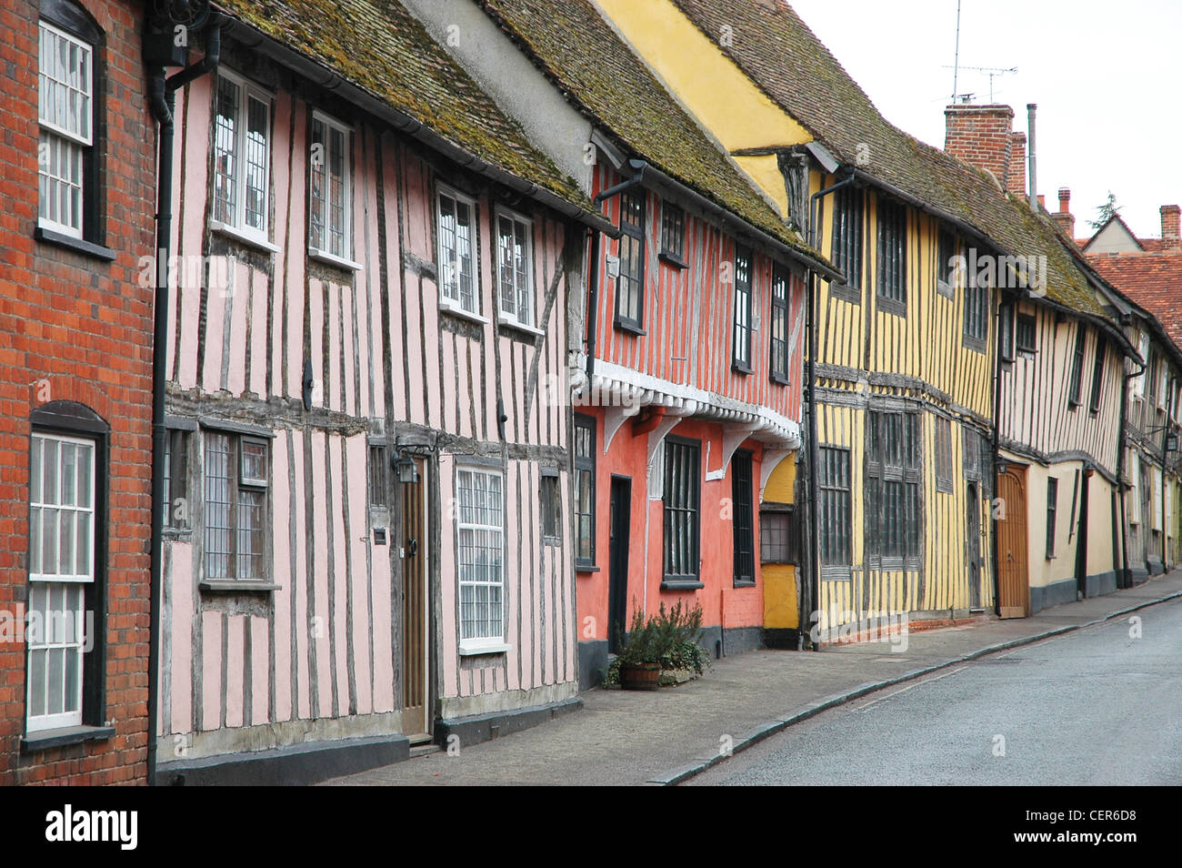 The Tudor facia of a terrace of houses in the Suffolk village of Lavenham. Stock Photo