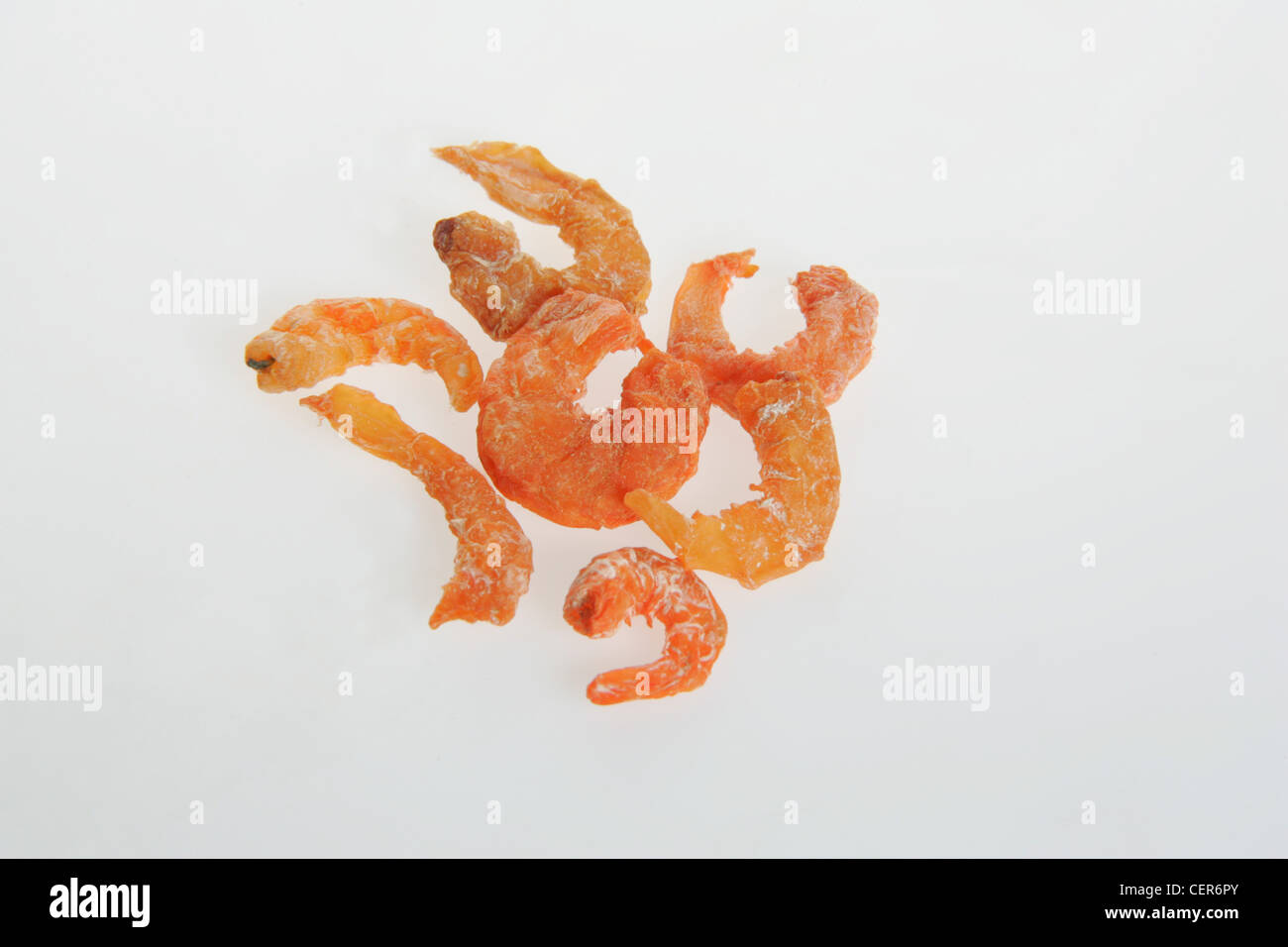 Dried prawns against white background Stock Photo Alamy