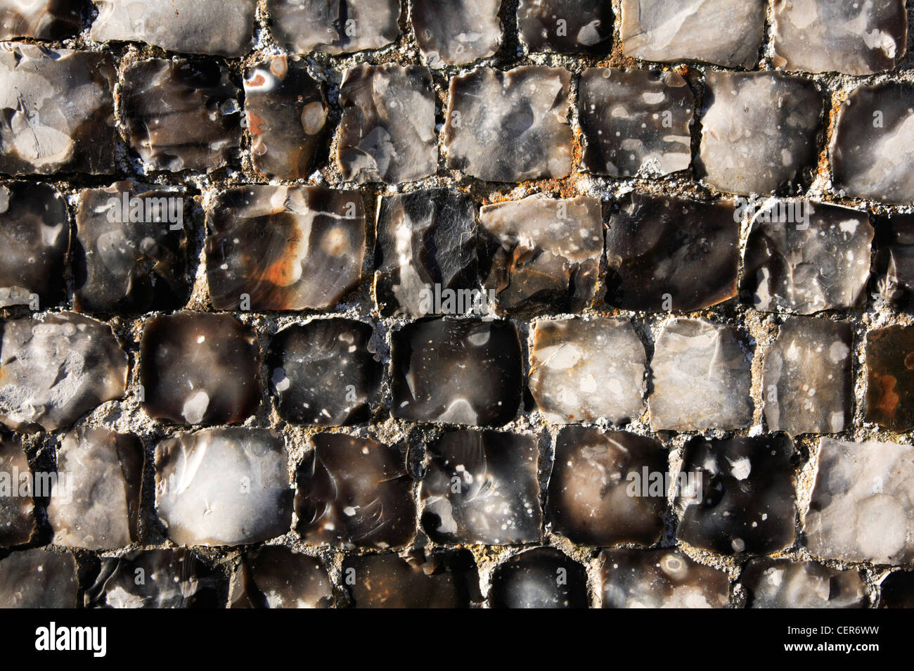 An example of flint flushwork at the Church of Saint Andrew at Framingham Pigot, Norfolk, England, United Kingdom, Europe. Stock Photo