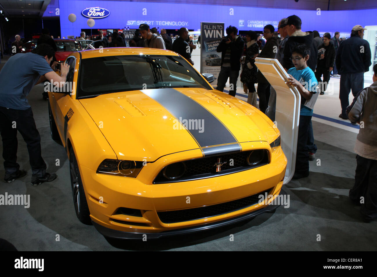 yellow muscle car ford front auto show Stock Photo
