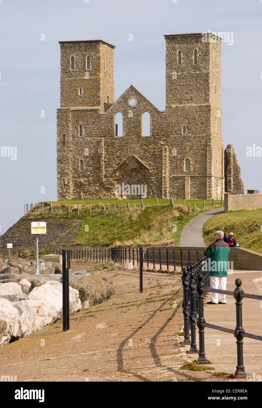 The ruined 14th century church that now stands on the edge of a cliff due to coastal erosion at Reculver on the North Kent coast Stock Photo