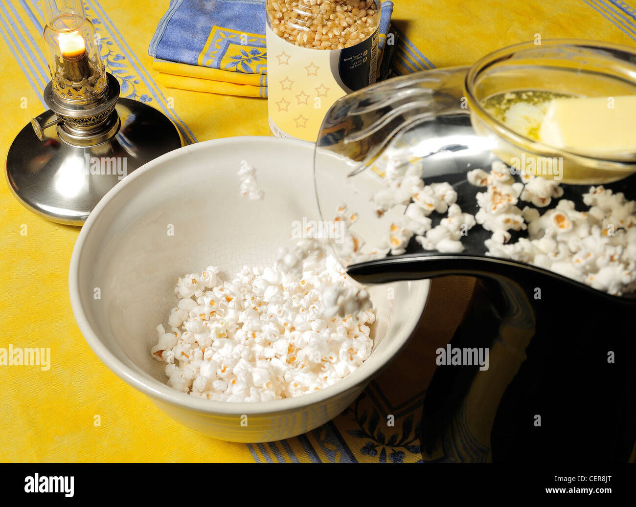 Making popcorn with an electric popper at home Stock Photo - Alamy