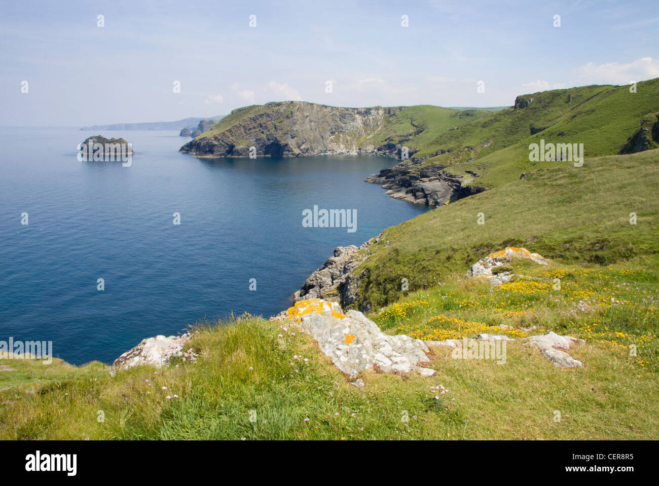 A view along the North Cornwall coastline from Barras Nose towards The Sisters islands. Stock Photo
